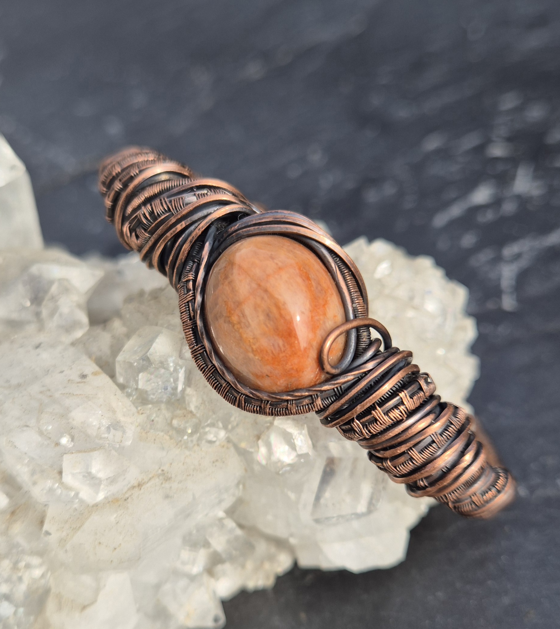 Sunstone Bracelet photographed with mineral crystals